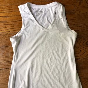 a bundle of athletic shirts